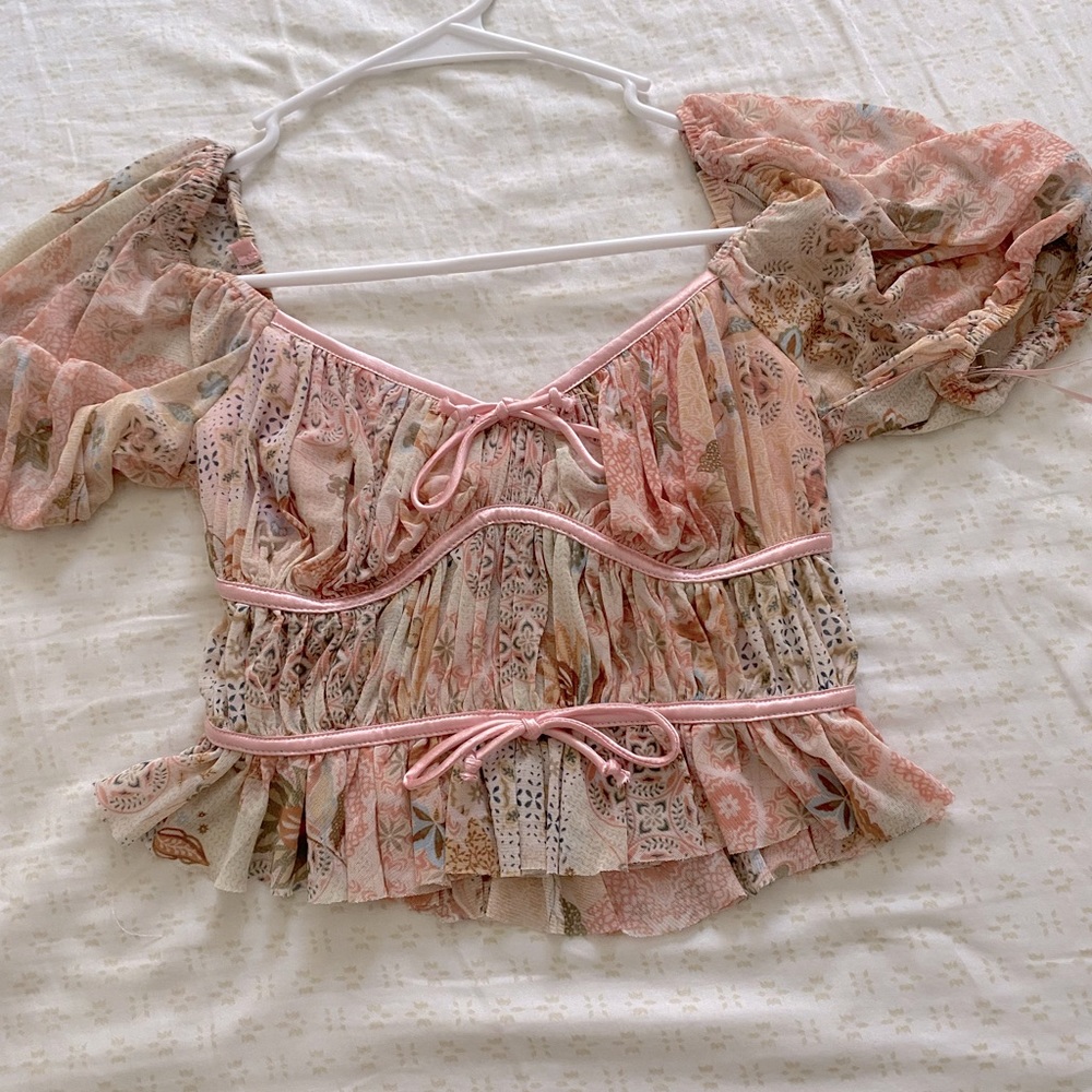 Isabelle’s cabinet puff sleeve top